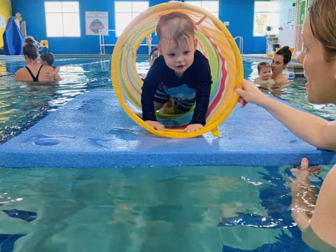 a boy in a pool