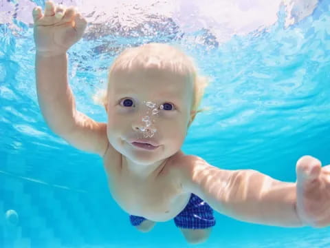 a child in a pool