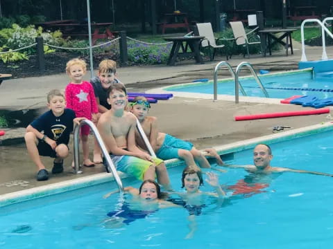 a group of people in a pool