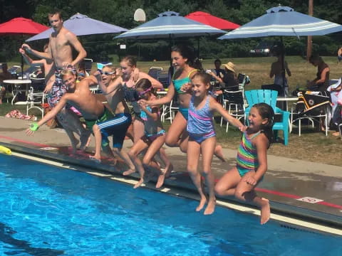 a group of people in a pool