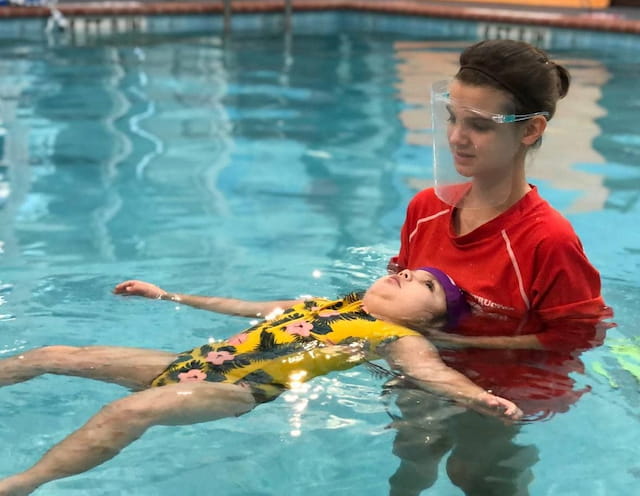 a person in a pool