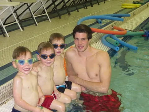 a group of people in a pool