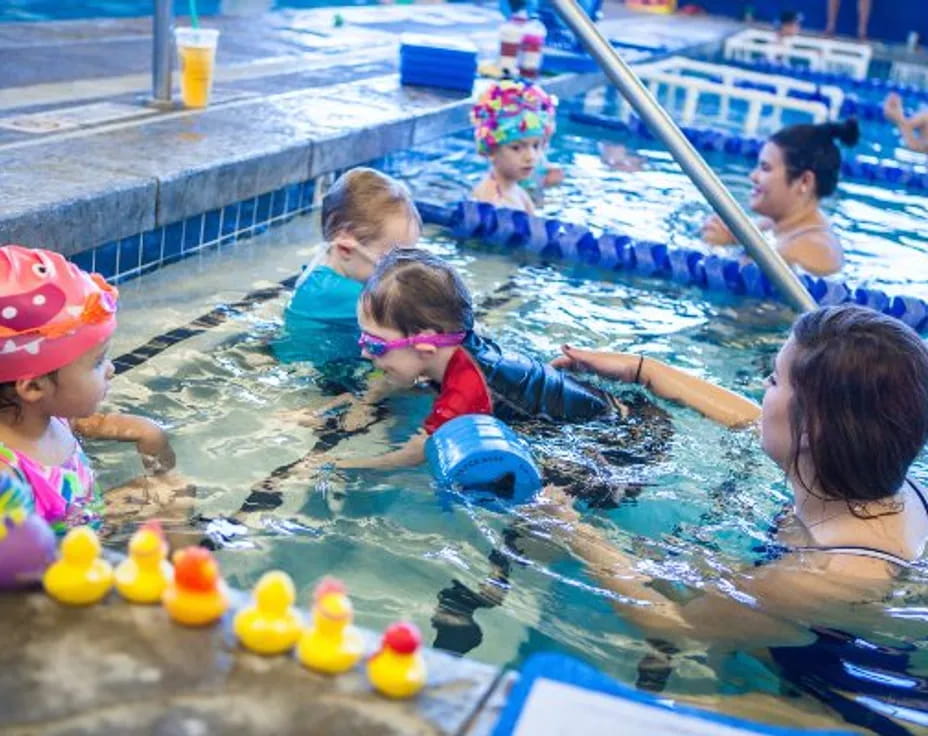 a group of people in a pool