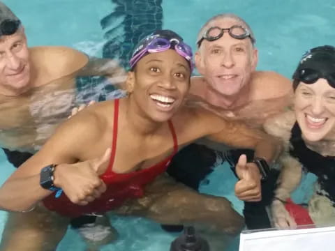 a group of people in a pool
