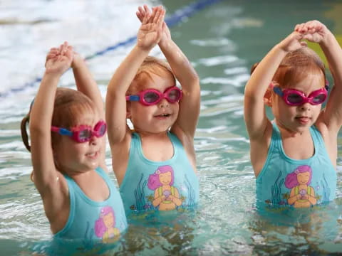 a group of girls in the water
