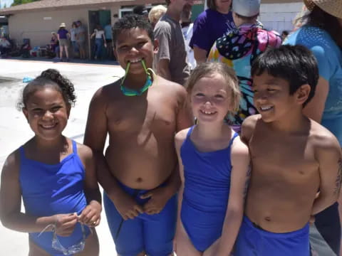 a group of people posing for a photo