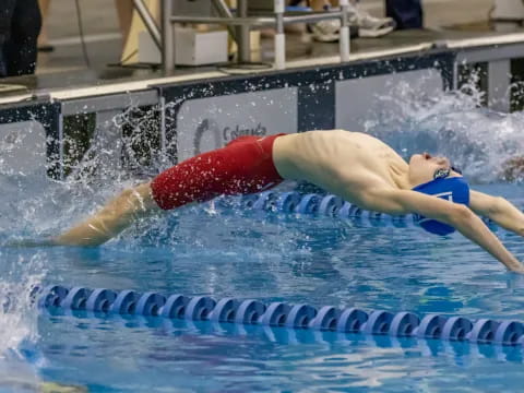 a person swimming in a pool