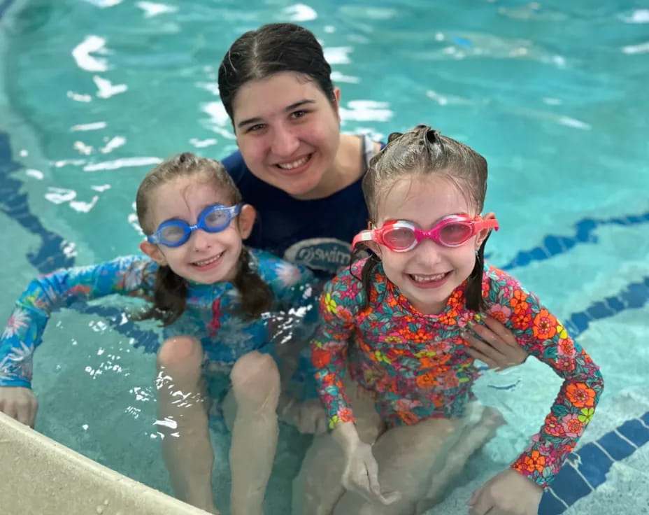 a group of people in a pool