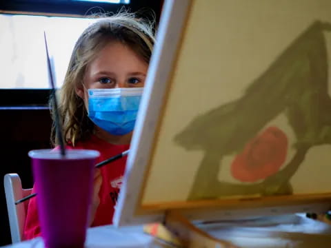 a person drinking from a cup