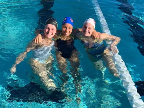 a group of women in a pool