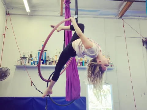 a woman doing a handstand