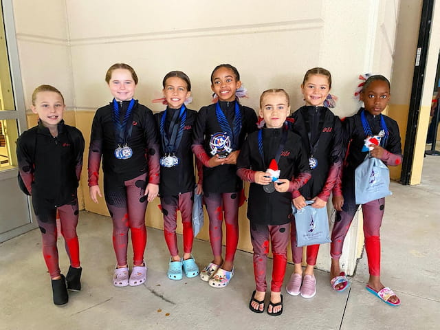 a group of children posing for a photo