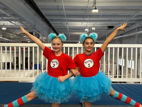 two girls wearing clothing