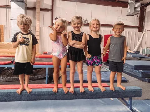 a group of children on a mat