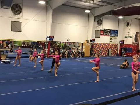 a group of women in a gym