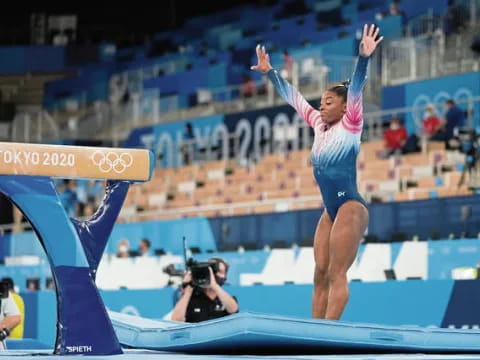 a person jumping on a stage