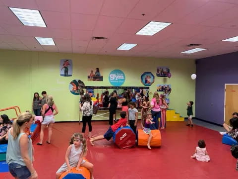 a group of people in a gym