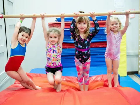 a group of children on a mat