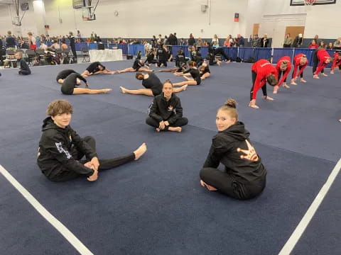 a group of people in a gym