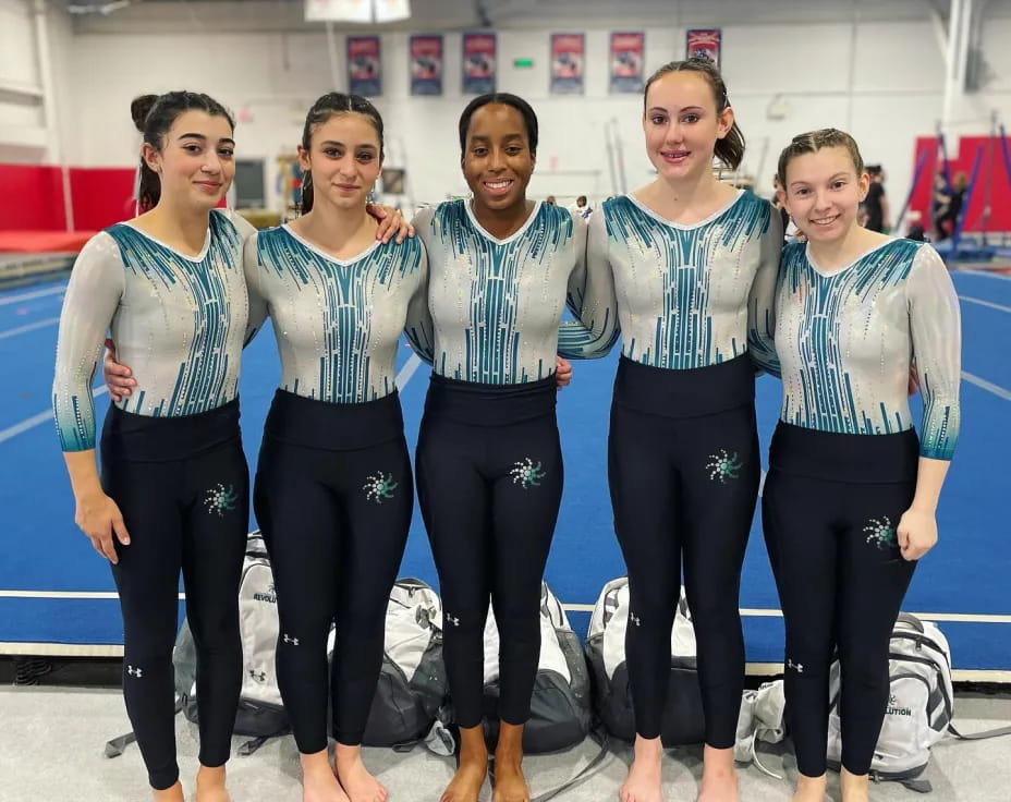 a group of women posing for a photo