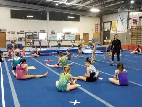 a group of people in a gym