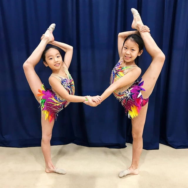 two girls wearing clothing