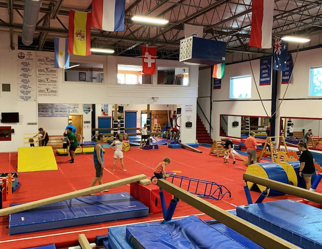 a group of people in a gym