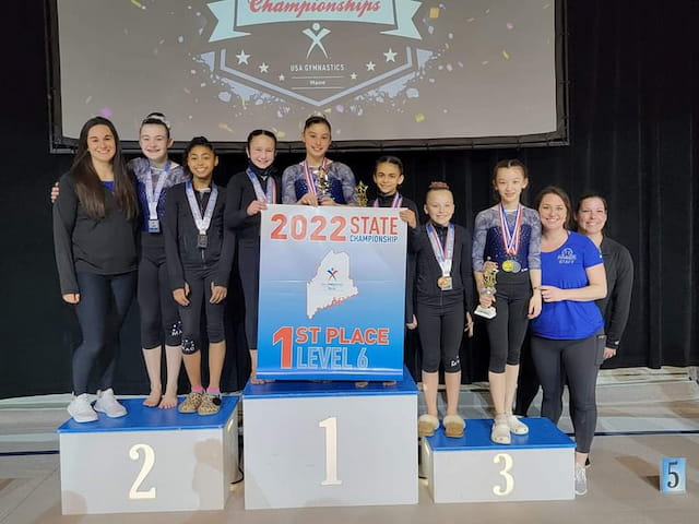 a group of people posing for a photo