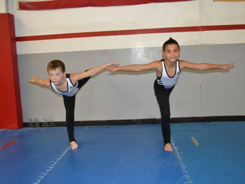 a couple of women doing yoga