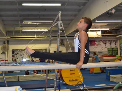 a person doing a plank on a bar
