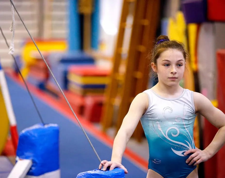 a girl in a tank top