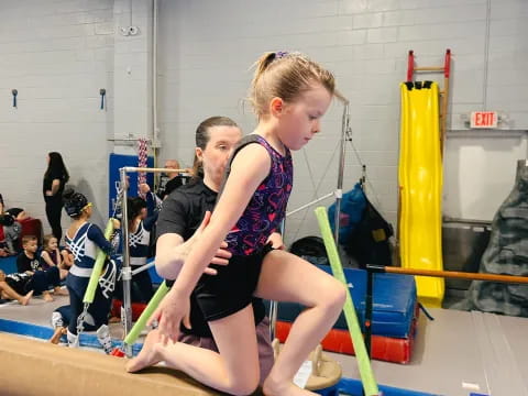 a couple of women in a gym