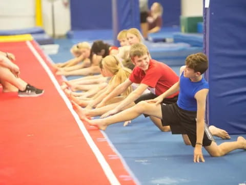 a group of people in a gym