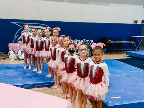 a group of girls in clothing