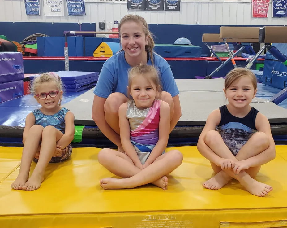 a group of children in a pool