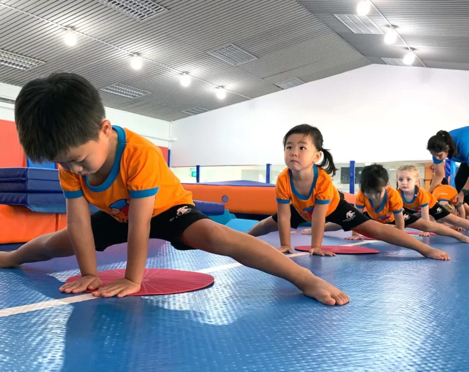 a group of children exercising