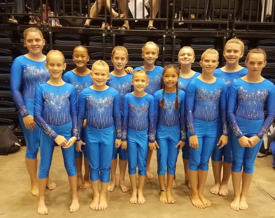 a group of people in blue uniforms