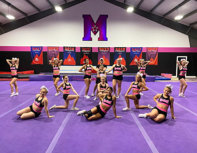 a group of women in a gym