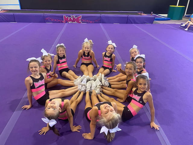 a group of women in a gym