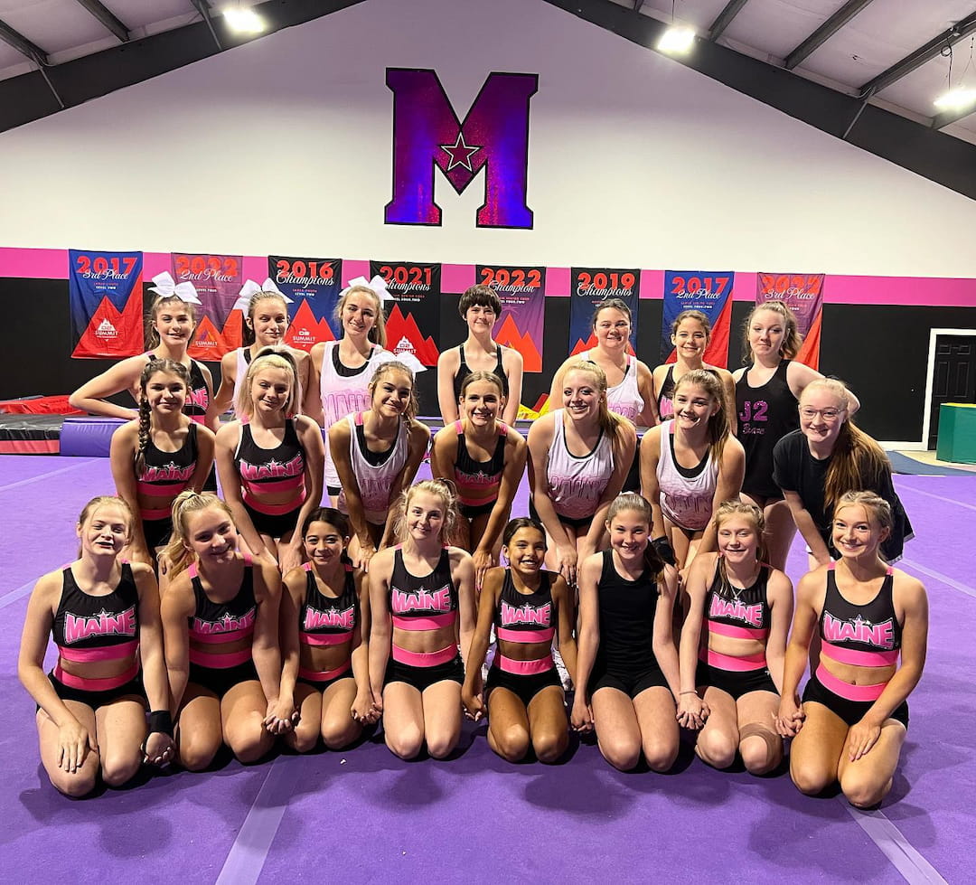a group of women posing for a photo