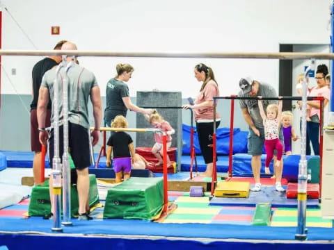 a group of people standing on a mat