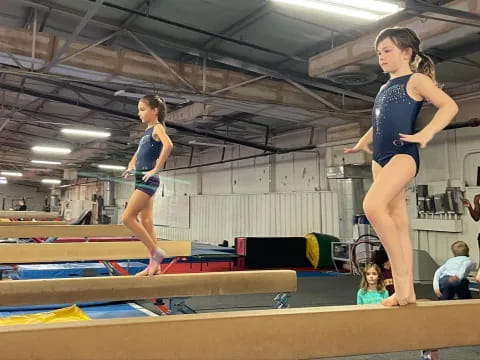 a couple of women in a gym