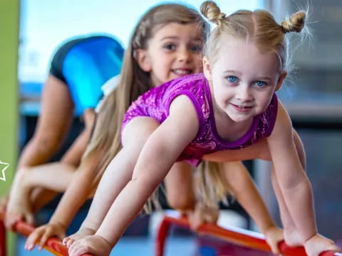 a couple of girls in a gym