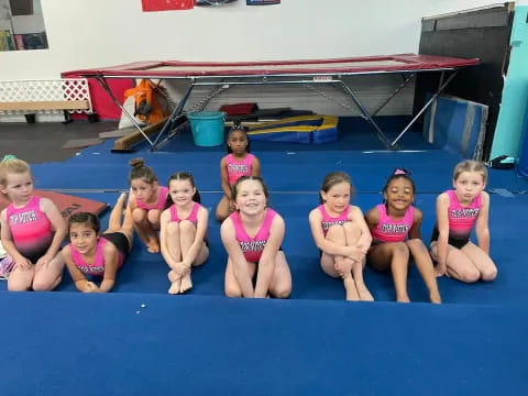 a group of girls in a pool