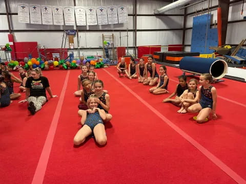 a group of children in a gym