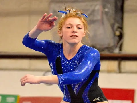 a girl in a blue dress