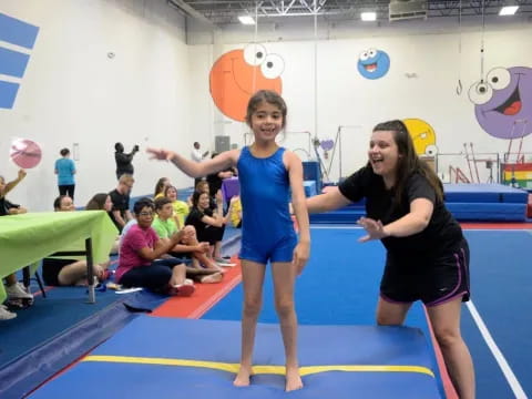 a couple of women in a gym