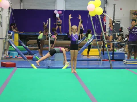 a group of women playing volleyball