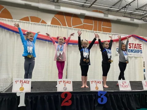 a group of women on a stage