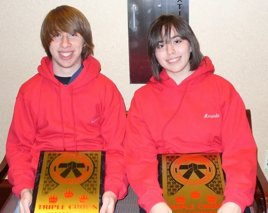 a couple of people holding books